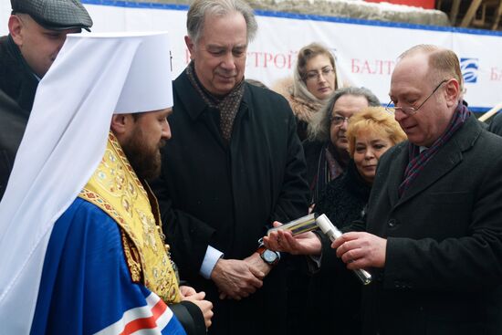 Placing a time capsule with a message to posterity