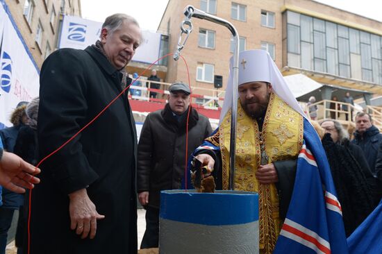Placing a time capsule with a message to posterity