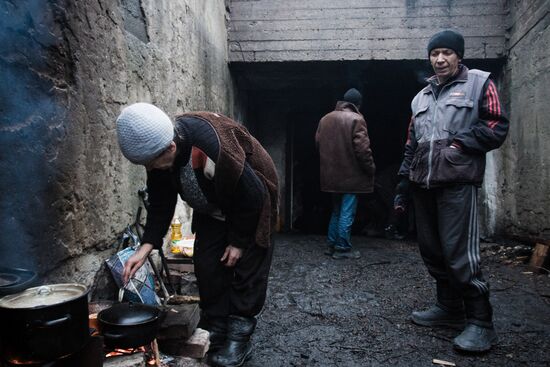 People in bombshelter in Maryinka, Donetsk region