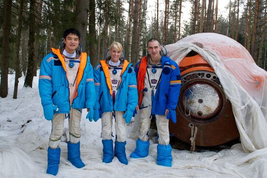 ISS crew takes survival course in a forest