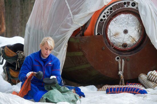 ISS crew takes survival course in a forest