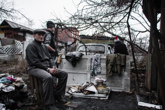 Aftermath of artillery attack on Donetsk's Kuibyshevsky District