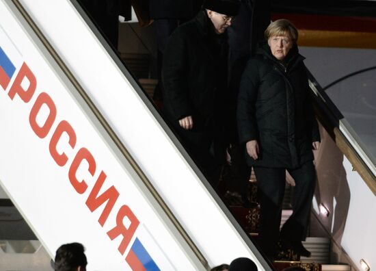 FRG Chancellor Angela Merkel and President of France Francois Hollande arrive in Moscow