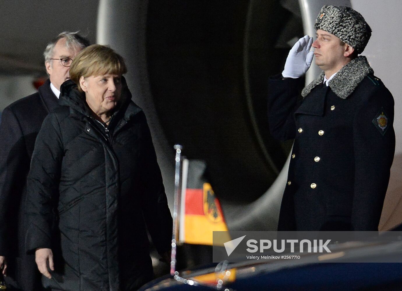 German Chancellor Angela Merkel and French President Francois Hollande arrive in Moscow