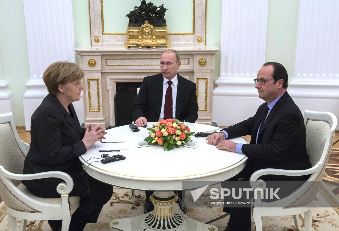 Russian President Vladimir Putin holds meeting with FRG Chancellor Angela Merkel and President of France Francois Hollande