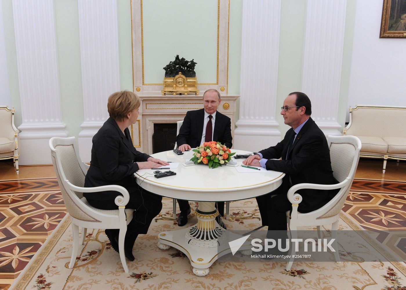Russian President Vladimir Putin holds meeting with FRG Chancellor Angela Merkel and President of France Francois Hollande