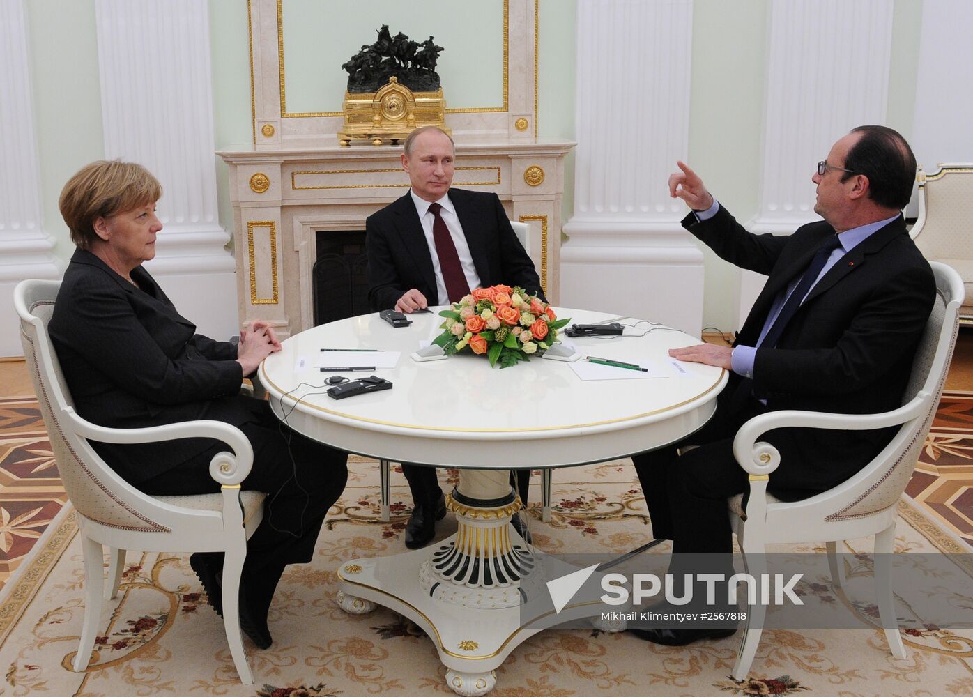 Russian President Vladimir Putin holds meeting with FRG Chancellor Angela Merkel and President of France Francois Hollande