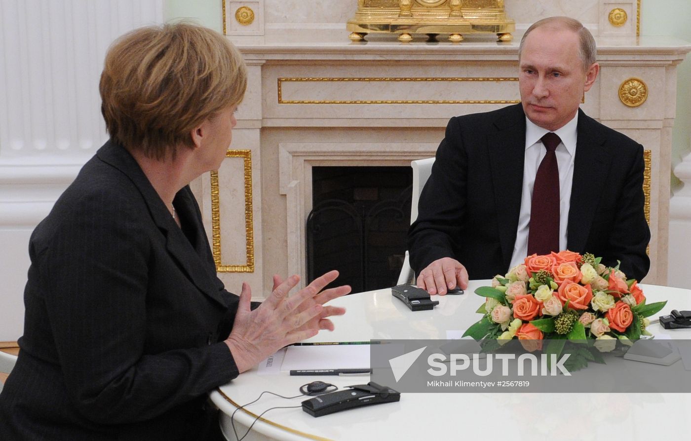 Russian President Vladimir Putin holds meeting with FRG Chancellor Angela Merkel and President of France Francois Hollande