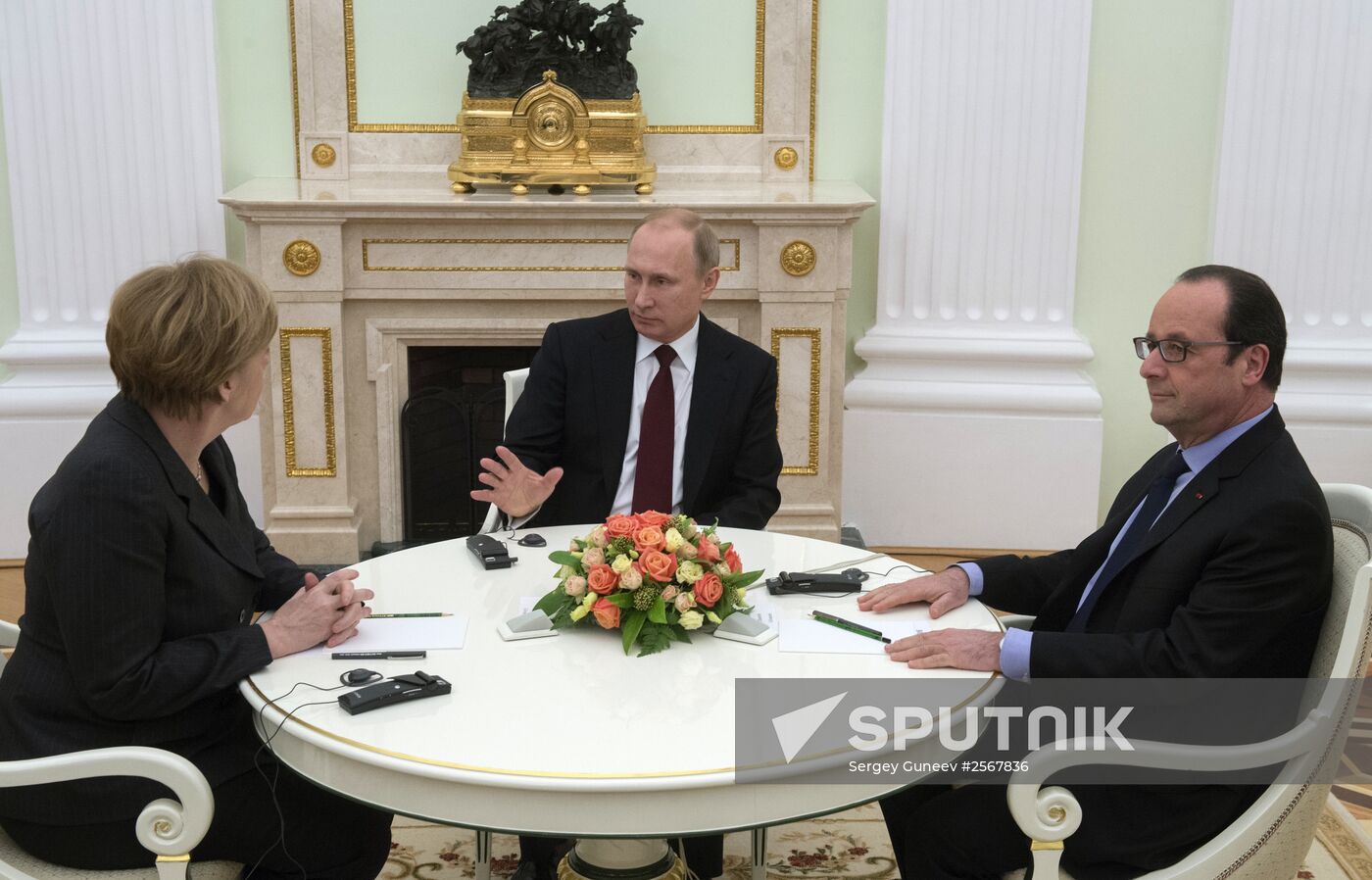 Russian President Vladimir Putin holds meeting with FRG Chancellor Angela Merkel and President of France Francois Hollande