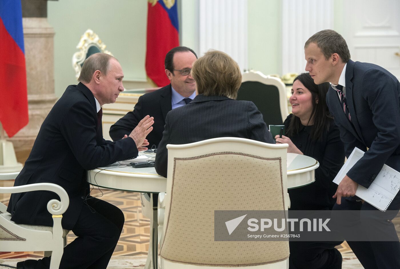 Russian President Vladimir Putin holds meeting with FRG Chancellor Angela Merkel and President of France Francois Hollande