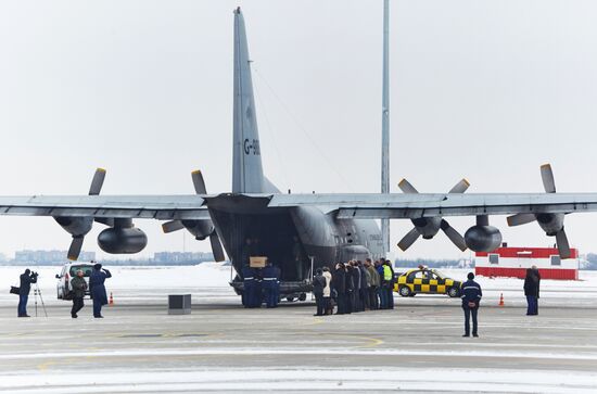 MH17 crash victims remains transported from Kharkiv