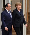 French President Francois Hollande and German Chancellor Angela Merkel at Independence Palace in Minsk before the peace talks on Ukraine. Location: Belarus, Minsk. Author: Viktor Tolochko/Sputnik. Russian, German, French and Ukrainian leaders meet for talks in Minsk