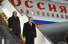 Russian President Vladimir Putin, right, upon arriving in Minsk airport before the peace talks on Ukraine held by Russian, German, French and Ukrainian leaders, February 11, 2015. Location: Belarus, Minsk. Author: Alexei Druzhinin/Sputnik. Russian, German, French and Ukrainian leaders meet for talks in Minsk