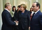 Foreground, from left: Russian President Vladimir Putin, German Chancellor Angela Merkel, and French President Francois Hollande at their meeting at Independence Palace in Minsk before the peace talks on Ukraine, February 11, 2015. Location: Belarus, Minsk. Author: Nikolay Lazarenko/Sputnik. Russian, German, French and Ukrainian leaders meet for talks in Minsk