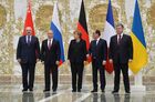 From left: Belarusian President Alexander Lukashenko, Russian President Vladimir Putin, German Chancellor Angela Merkel, French President Francois Hollande, and Ukrainian President Petro Poroshenko pose for a group photo at Independence Palace in Minsk after restricted attendance peace talks on Ukraine held by Russian, German, French and Ukrainian leaders, February 11, 2015. Location: Belarus, Minsk. Author: Alexei Druzhinin/Sputnik. Russian, German, French and Ukrainian leaders meet for talks in Minsk