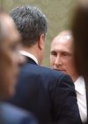 February 11, 2015. Russian President Vladimir Putin, right, and Ukrainian President Petro Poroshenko at Independence Palace in Minsk before peace talks on Ukraine held by Russian, German, French and Ukrainian leaders. Location: Belarus, Minsk. Author: Nikolay Lazarenko/Sputnik. Russian, German, French and Ukrainian leaders meet for talks