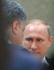 February 11, 2015. Russian President Vladimir Putin, right, and Ukrainian President Petro Poroshenko during peace talks on Ukraine held by the Russian, German, French and Ukrainian leaders. Location: Belarus, Minsk. Author: Alexei Druzhinin/Sputnik. Russian, German, French and Ukrainian leaders meet for talks in Minsk