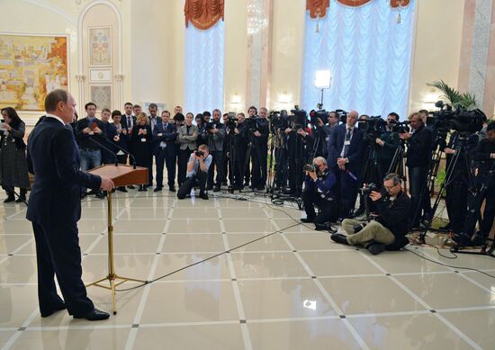 Russian President Vladimir Putin gives news conference following Minsk talks