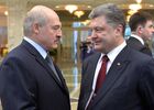 Belarusian President Alexander Lukashenko, left, and Ukrainian President Petro Poroshenko at Independence Palace in Minsk after peace talks on Ukraine between the Russian, German, French and Ukrainian leaders. Location: Belarus, Minsk. Author: Viktor Tolochko/Sputnik. Russian, German, French and Ukrainian leaders meet for talks
