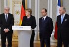 From left: German Foreign Minister Frank-Walter Steinmeier, German Chancellor Angela Merkel, French President Francois Hollande and French Foreign Minister Laurent Fabius at a news conference at Independence Palace in Minsk following peace talks on Ukraine between the Russian, German, French and Ukrainian leaders. Location: Belarus, Minsk. Author: Viktor Tolochko/Sputnik. Russian, German, French and Ukrainian leaders meet for talks in Minsk