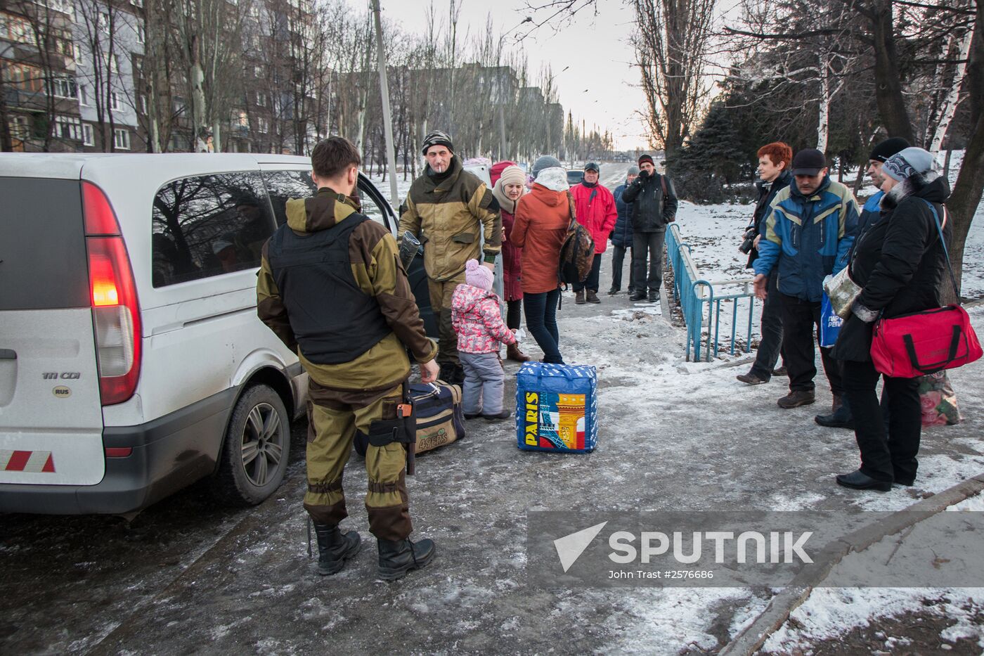 Militia of the Angel volunteer peacekeeping unit evacuate Donbas refugees