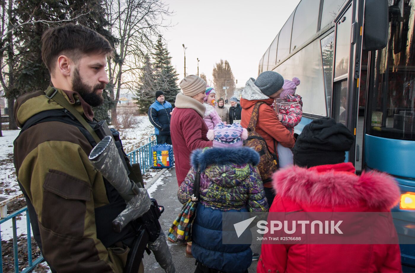 Militia of the Angel volunteer peacekeeping unit evacuate Donbas refugees