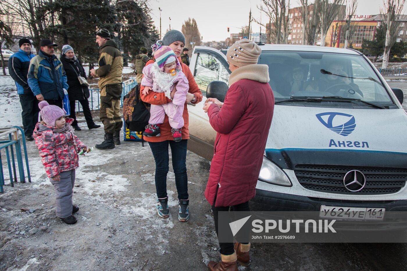 Militia of the Angel volunteer peacekeeping unit evacuate Donbas refugees