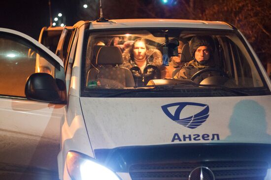 Militia of the Angel volunteer peacekeeping unit evacuate Donbas refugees