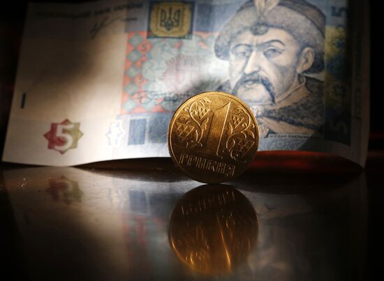 US and Ukrainian notes and coins