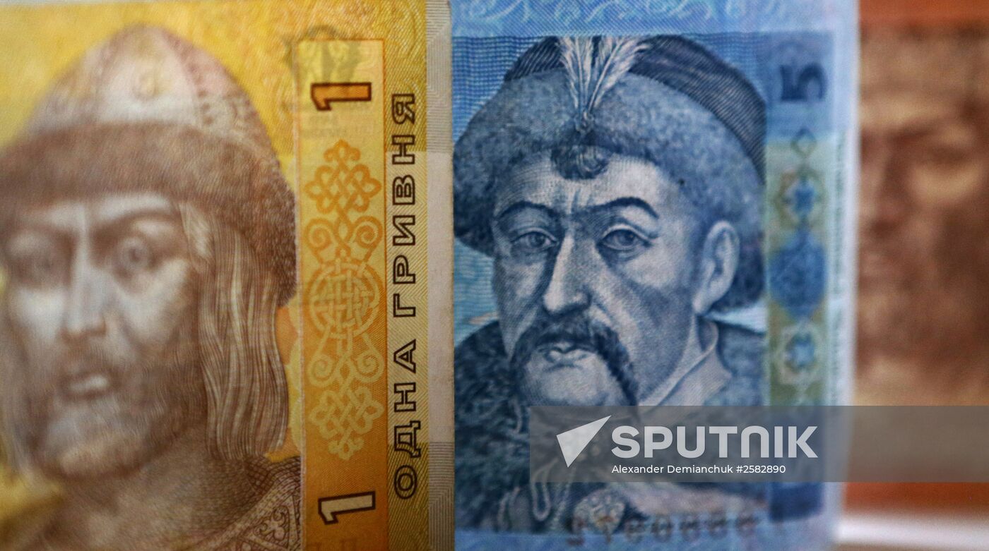 US and Ukrainian notes and coins