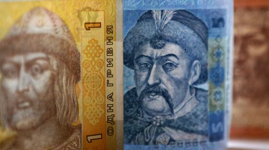 US and Ukrainian notes and coins