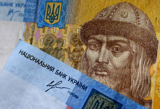 US and Ukrainian notes and coins