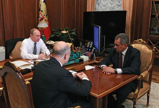 President Vladimir Putin meets with Ministers of Defense, Finance