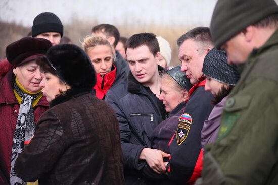 Miners who died in Zasyadko coal mine blast are buried in Donetsk