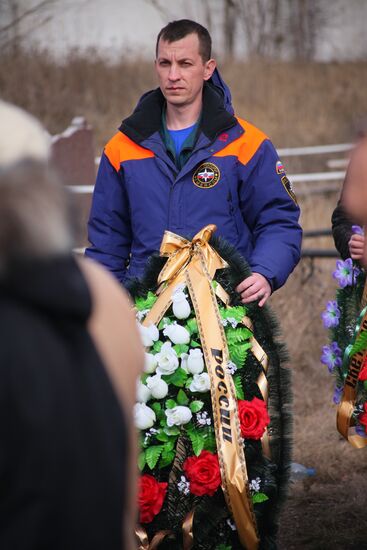 Miners who died in Zasyadko coal mine blast are buried in Donetsk