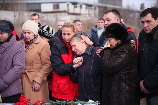 Miners who died in Zasyadko coal mine blast are buried in Donetsk
