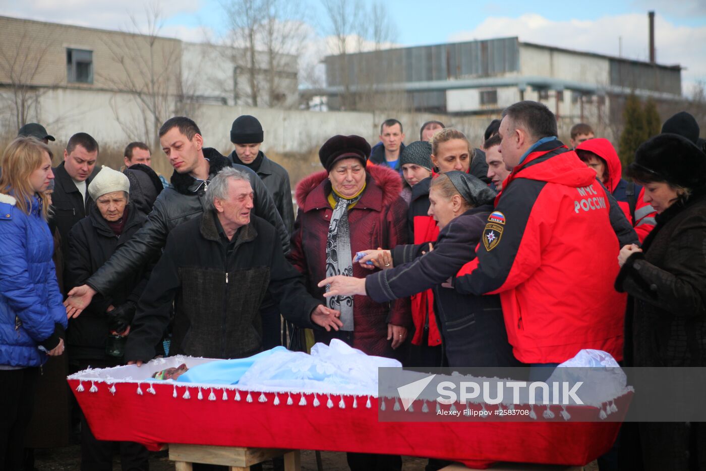 Miners who died in Zasyadko coal mine blast are buried in Donetsk