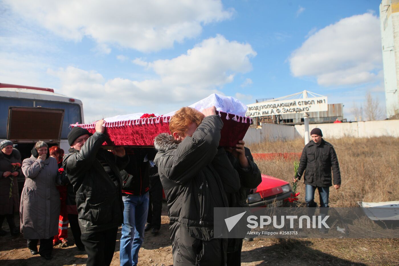Miners who died in Zasyadko coal mine blast are buried in Donetsk