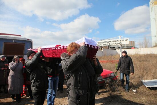 Miners who died in Zasyadko coal mine blast are buried in Donetsk