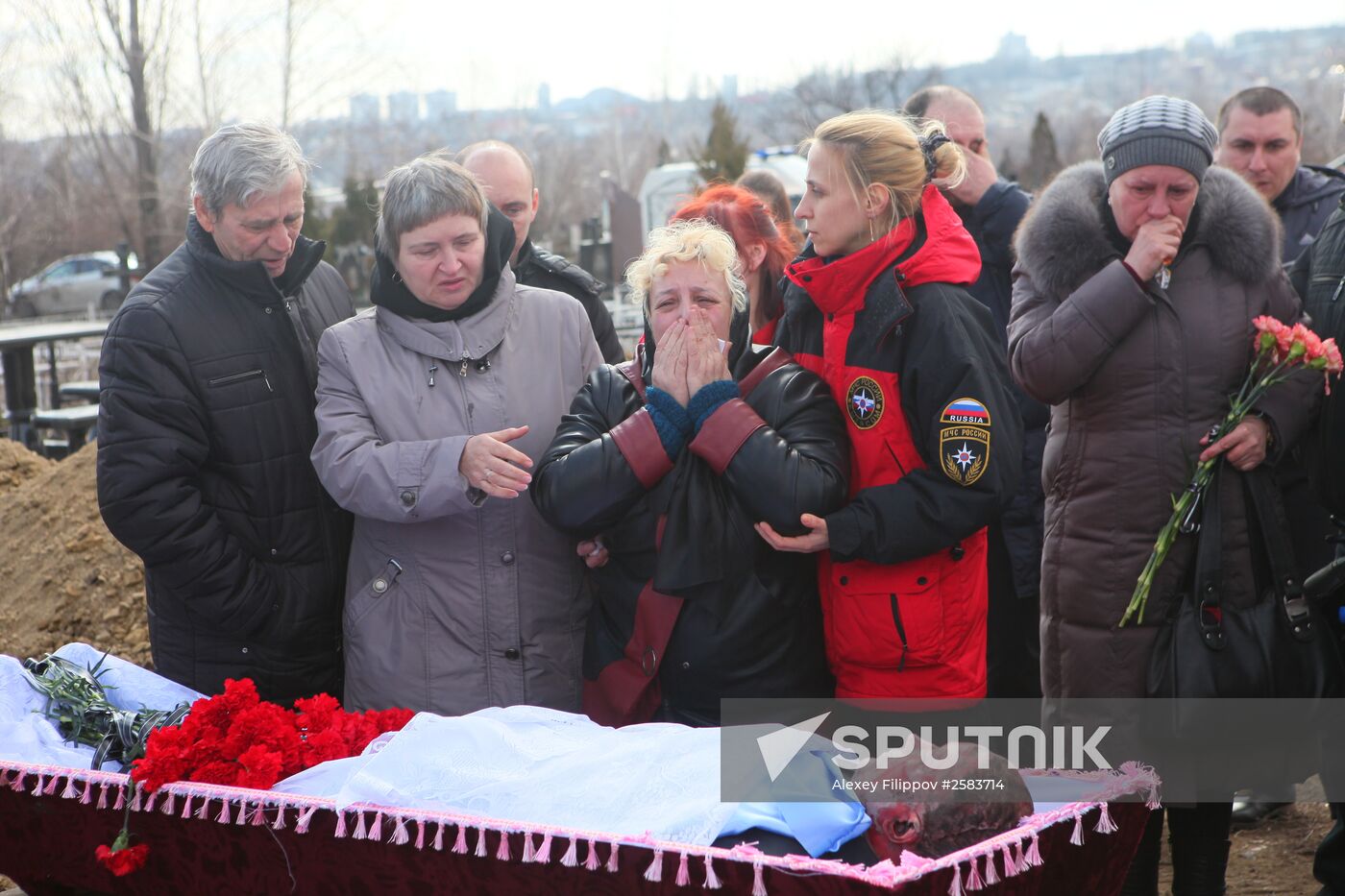 Miners who died in Zasyadko coal mine blast are buried in Donetsk