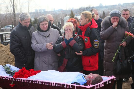 Miners who died in Zasyadko coal mine blast are buried in Donetsk