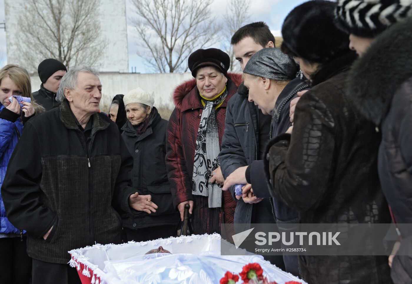 Miners who died in Zasyadko coal mine blast are buried in Donetsk