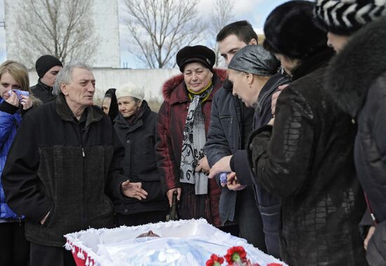 Miners who died in Zasyadko coal mine blast are buried in Donetsk