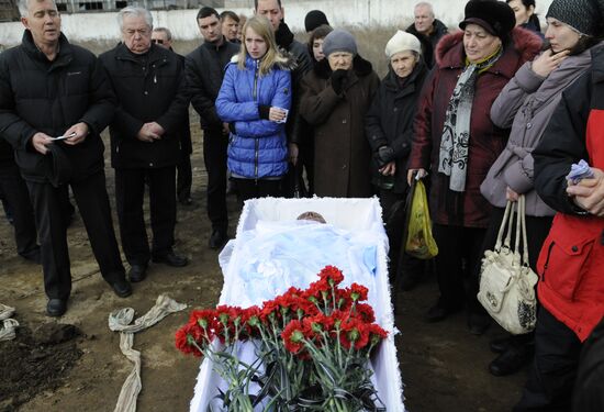 Miners who died in Zasyadko coal mine blast are buried in Donetsk