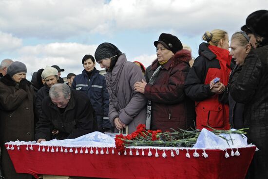 Miners who died in Zasyadko coal mine blast are buried in Donetsk