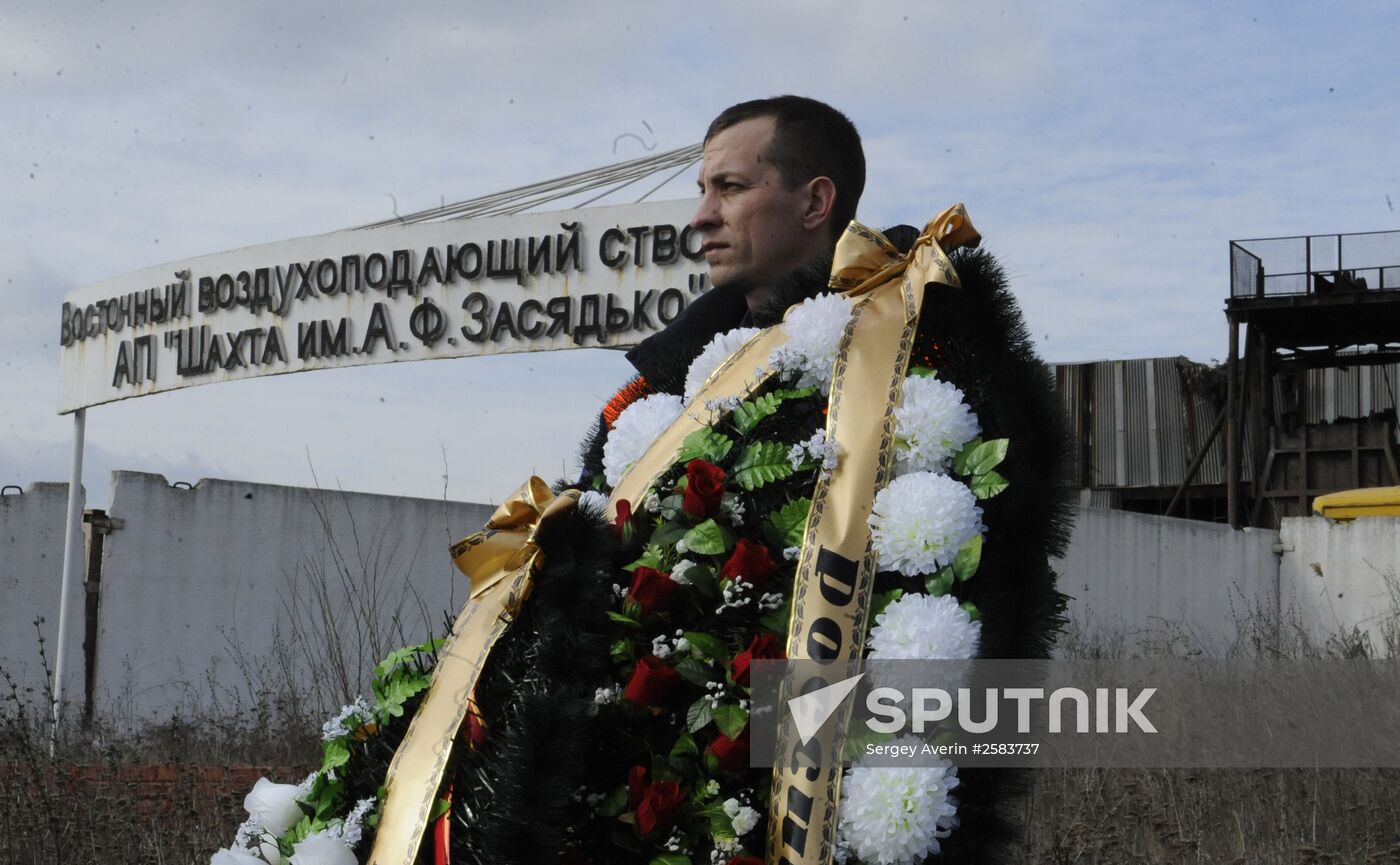Miners who died in Zasyadko coal mine blast are buried in Donetsk