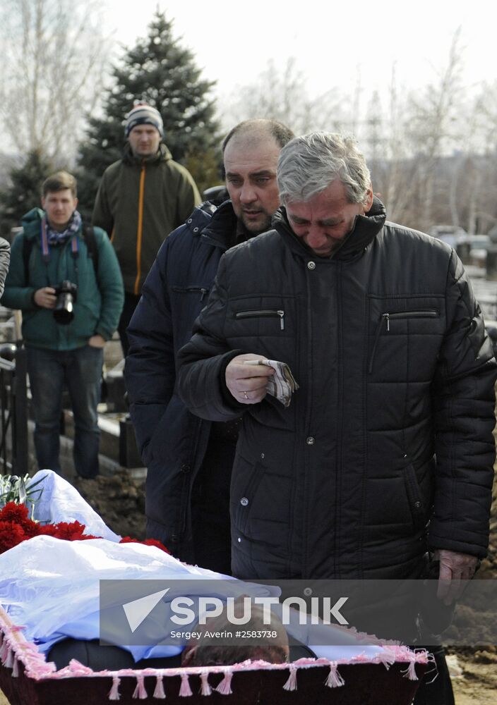 Miners who died in Zasyadko coal mine blast are buried in Donetsk