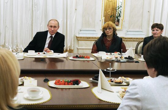 Russian President Vladimir Putin congratulates all Russian women on International Women's Day
