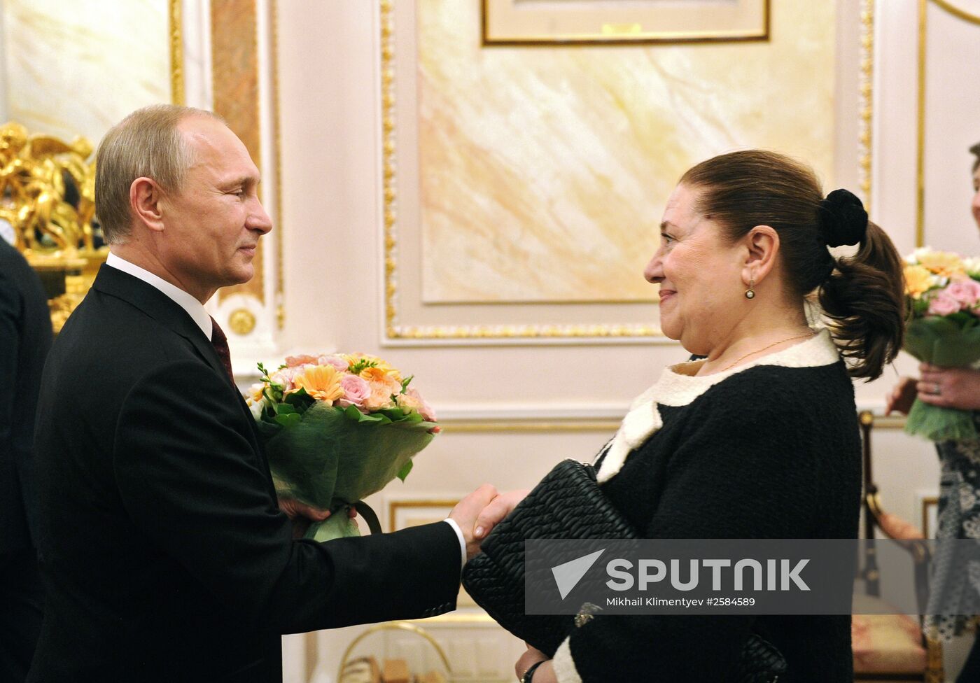 Russian President Vladimir Putin congratulates all Russian women on International Women's Day