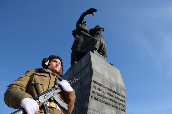 Flower-laying ceremony at monument to Urals Volunteer Tank Corps